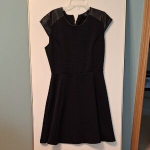 Elegant Black Dress with Leather Accents